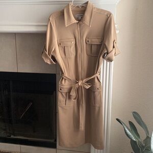 Cream dress size 10 that has a tie around the waist